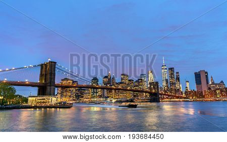 Brooklyn Bridge and Manhattan at sunset - New York, United Stated