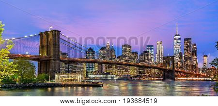 Brooklyn Bridge and Manhattan at sunset - New York, United Stated