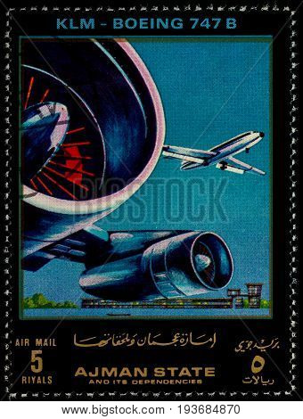 Moscow Russia - July 03 2017: A stamp printed in Ajman shows passenger airliner Boeing 747B KLM series "Modern Passenger Airplanes" circa 1972