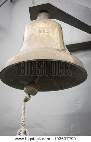 Ship Tour USS Kearsarge (LHD 3) Wasp-class amphibious assault ship: U.S. engraved on the brass bell on flight deck of the USS Kearsarge (LHD 3). Fleet Week NEW YORK MAY 25 2017.