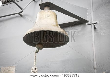 Ship Tour USS Kearsarge (LHD 3) Wasp-class amphibious assault ship: U.S. engraved on the brass bell on flight deck of the USS Kearsarge (LHD 3). Fleet Week NEW YORK MAY 25 2017.