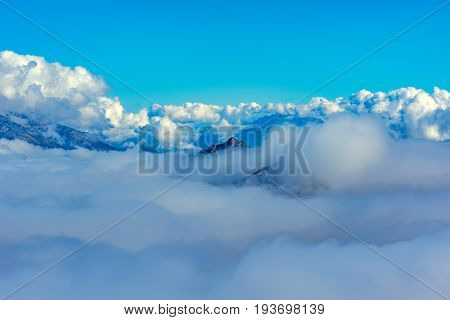 Clouds cover the mountain tops. Caucasus. Russia.