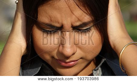 A Close Up of an Anxious Hispanic Girl Teen