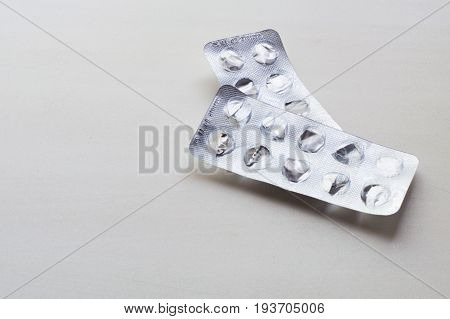 Used Packs Of Pills On Medical Table