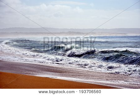 Wave and sand beach for background. Beautiful beach surface texture. Sea wave on sand beach digital illustration. Oceanic water tide on seashore. Belmont beach Australia.