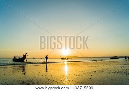 People on the beach in Ao Nang Krabi at sunset