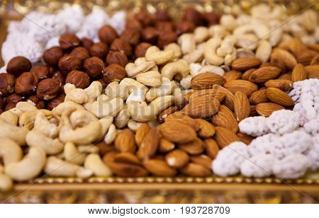 Natural background made from different kinds of nuts close up