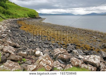 The colorful beach of Tianavaig Bay close to Camastianavaig, Isle of Skye, Highlands, Scotland, UK