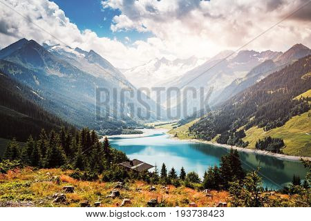 Awesome image of the Durlassboden reservoir. Location municipality of Gerlos in Zillertal valley, Austrian states of Tyrol and Salzburg. Reichenspitz range, High Tauern National Park. Beauty world.