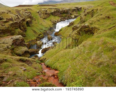Waterfalls Cascade At River Skoga In Iceland