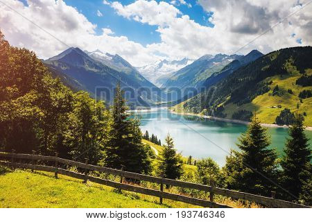 Awesome image of the Durlassboden reservoir. Location municipality of Gerlos in Zillertal valley, Austrian states of Tyrol and Salzburg. Reichenspitz range, High Tauern National Park. Beauty world.