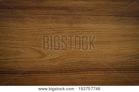 Dark brown wooden texture for background. Closeup