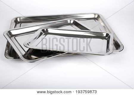 Set Of  Thre Metal Backing Trays On White Background