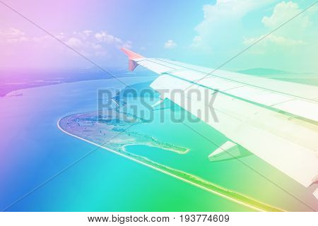 Colorful filter sky and cloud view on airplane