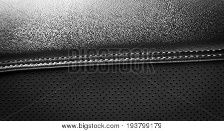 Modern sport car  black leather interior. Part of  leather car seat details.