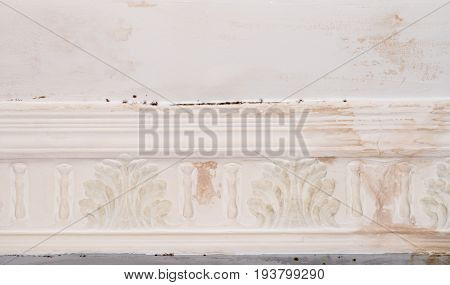 Wall paint that peels off and fades off due to moisture problems in wallcovering, needs repaired and repainted. Ruined by mold fungus and mildew plastering plaster ceiling