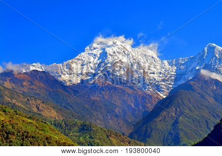 Mountain Landscape in Himalaya. Annapurna South peak top , Nepal, view from Landruk.