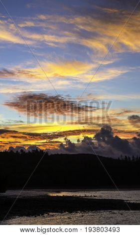 Beautiful of sunset at coastline with colorful clouds