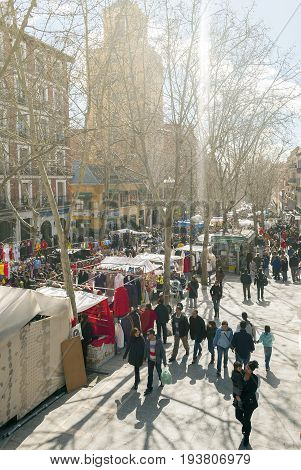 Madrid Spain february 28 2010: Scene from El Rastro flea market in Madrid Spain. El Rastro is held in La Latina neighborhood every Sunday and it's the most important market in Madrid.