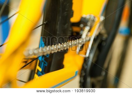 Chain bike in a blurred background of the rear wheel