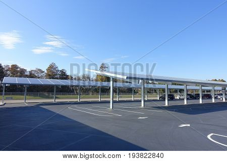 HOUSTON, USA - JANUARY 12, 2017: Some cars parked, with a solar panel protecting from the sun the cars in Legoland park, Legoland is a theme park based on the popular LEGO brand of building toys.