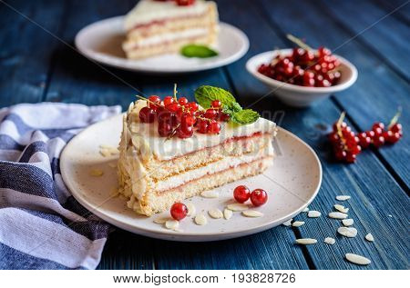 Delicious Cake With Mascarpone, Whipped Cream, Red Currant And Almond Slices