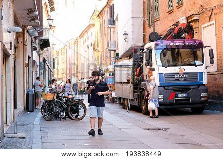 Ferrara, Italy - June, 30, 2017: truck parked on a pedestrian street in a center of Ferrara, Italy