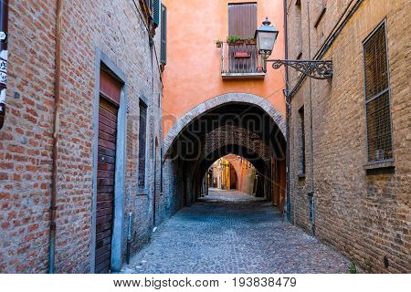 Ferrara, Italy - June, 30, 2017: district of a medieval houses in a center of Ferrara, Italy