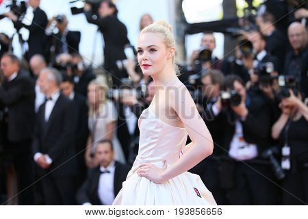 Elle Fanning attends the 'Ismael's Ghosts (Les Fantomes d'Ismael)' screening and Opening Gala during the 70th annual Cannes Film Festival at Palais des Festivals on May 17, 2017 in Cannes, France. 