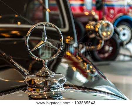 Photo made on June 25 2017 - Mercedes-Benz Museum Stuttgart Germany -Mercedes-Benz logo. Technical Director of Deutz Gottlieb Daimler designed it.