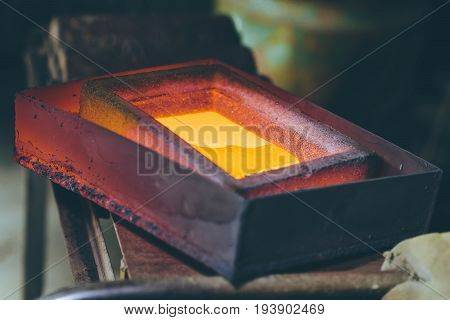 Melting gold at a mill, gold mining