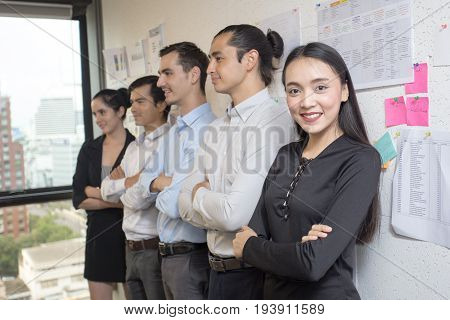 Asian Businesswoman And Team Standing Together With Attractive Smiling At Working Place Business Tea