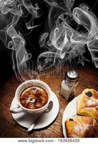 a cup of coffee and cakes - still life