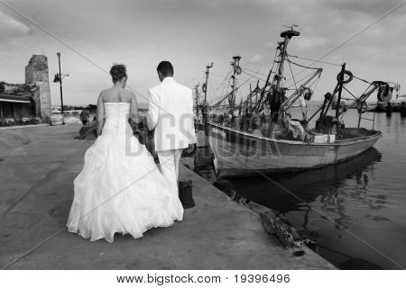 couple groom and the bride in fishing to port