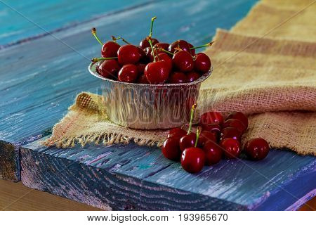 Cherry On A Wooden Board Closeup