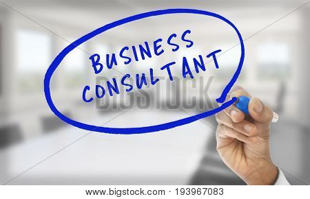 Hand writing Business Consultant with blue pencil
