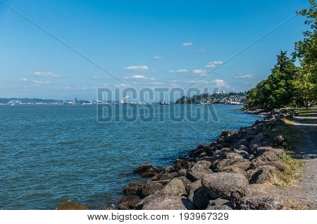 A view of the shoreline in Ruston Washington. Mount Rainier is in the distance.