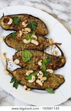 Grilled spisy eggplants. grilled eggplants with garlic yogurt sauce and walnuts