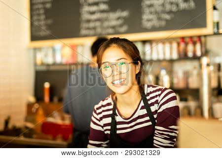 Asian Woman Amiling Work In Small Business Owner Food And Drink Cafe.
