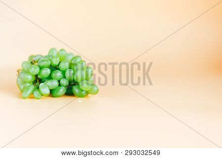 Green Grapes Kish Mish On Orange Background