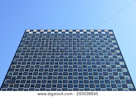 Vado Ligure, Italy - Circa September 2017. View Of Office Building Near Th Shopping Center Molo 8.44