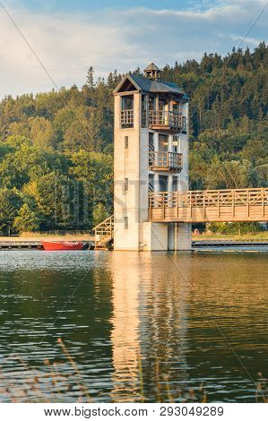 Stara Morawa, Observation Tower By The Lake Among Mountain Peaks.