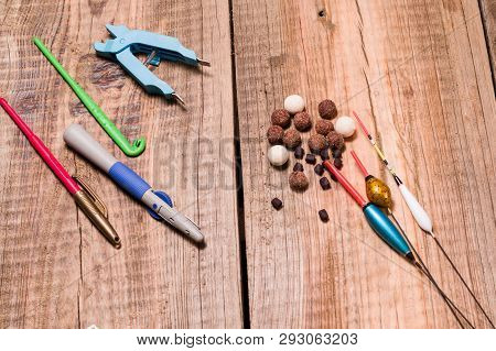 Fishing floats. Boilies and pellets for bait. Fishing on pellets. Front.