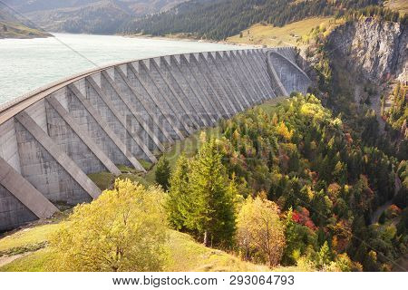 Reservoir In The Alps Is Known For Its Large, High Concrete Dam. Aerial Morning View Of Roselend Lak