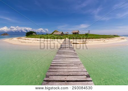 Beautiful Small Island In Indonesia With Mountain View And Beautiful Sea