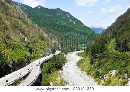 Highway In Italian Mountains Near Pontebba. View From The Bicycle Road.
