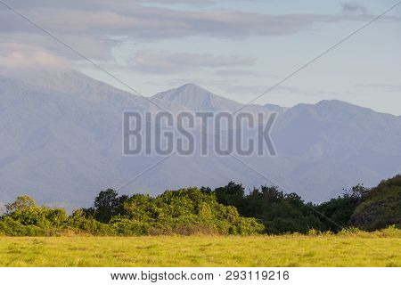 Mountain View In The Morning With Side Light And Yellow Grass From Kenawa Island