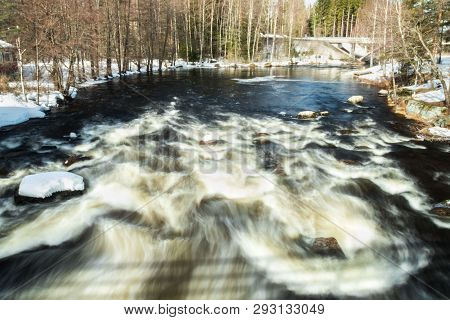 Long Exposure Photo. Rough River Jokelanjoki And Stones In Water, Kouvola, Finland.