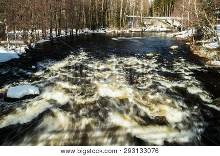 Long Exposure Photo. Rough River Jokelanjoki And Stones In Water, Kouvola, Finland.