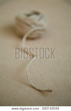 Old Skein Of Jute Twine On The Vintage Background.